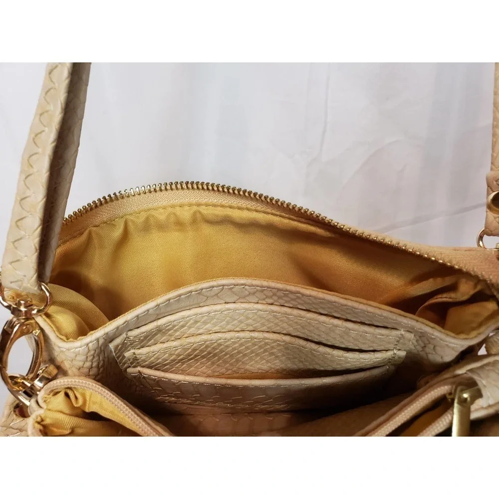 Tan crossbody. Approx 20